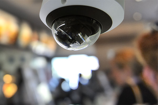 A surveillance camera overlooks a fast food restaurant.