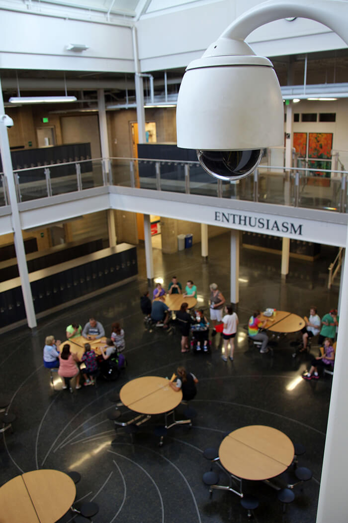 a video surveillance camera overlooks a school cafeteria