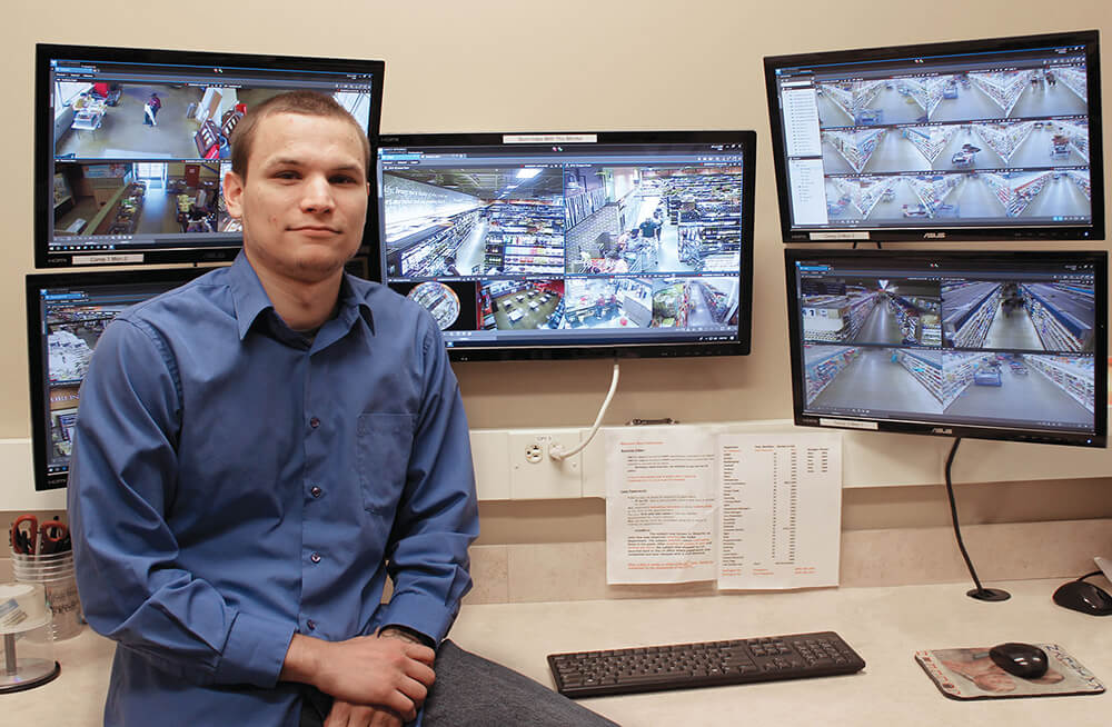 Colin Gubernick, Eickhoff’s Supermarkets Senior Investigator, sits with the company’s March Networks video surveillance system