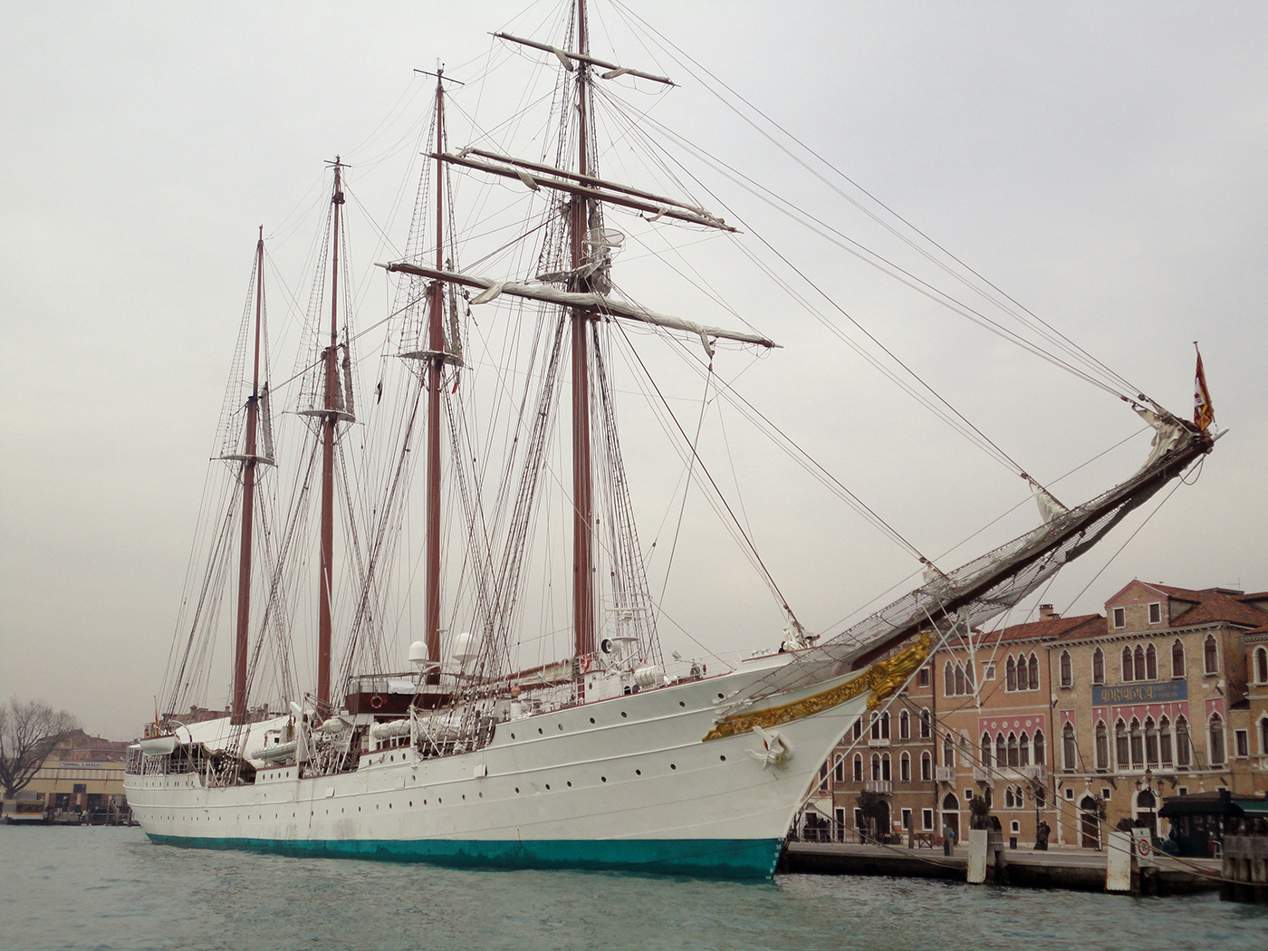 A passenger ship docked at the Port of Venice
